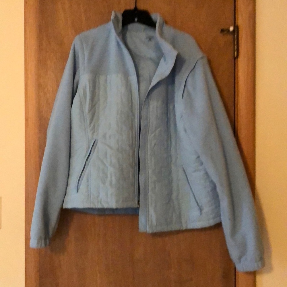 Light blue light weight coat.